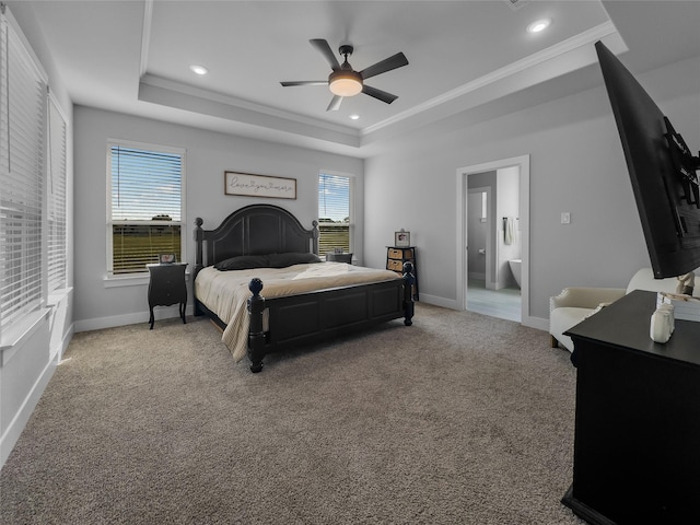 bedroom featuring recessed lighting, carpet flooring, baseboards, ornamental molding, and a raised ceiling