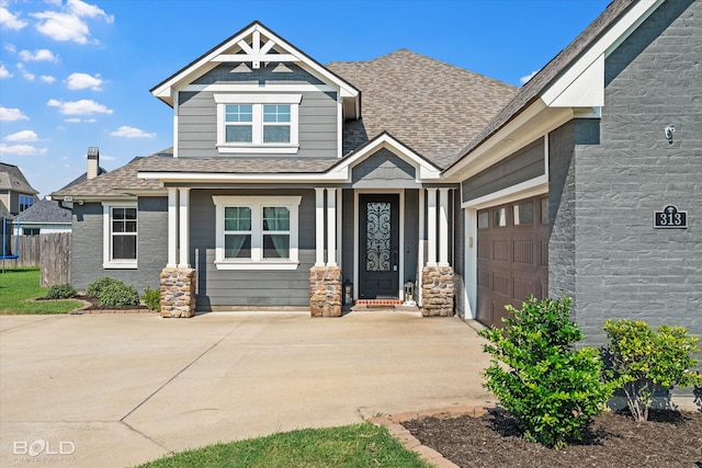 view of front of property with a garage