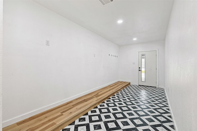 foyer featuring hardwood / wood-style floors