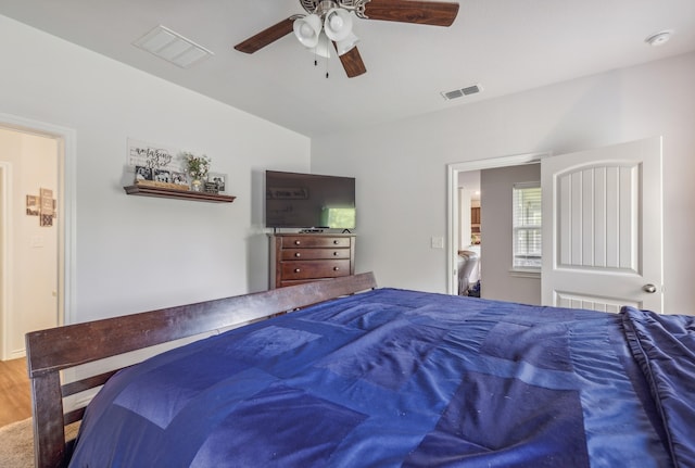 bedroom featuring ceiling fan and wood-type flooring