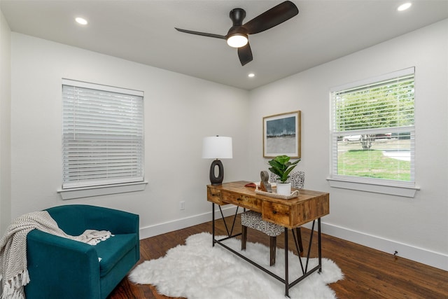 office area with ceiling fan and dark hardwood / wood-style flooring