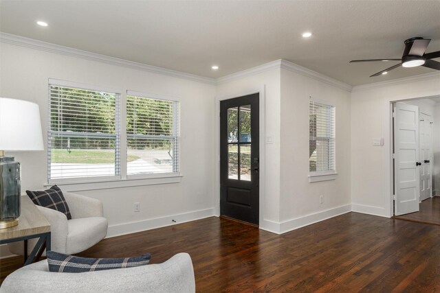 living area featuring ceiling fan, crown molding, hardwood / wood-style flooring, and a healthy amount of sunlight