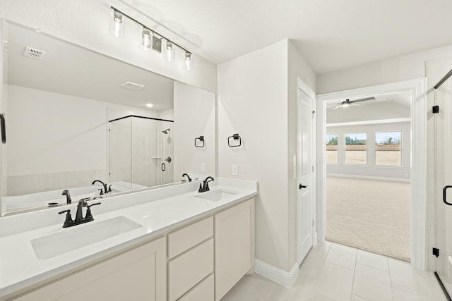 bathroom featuring ceiling fan, tile patterned floors, independent shower and bath, and vanity