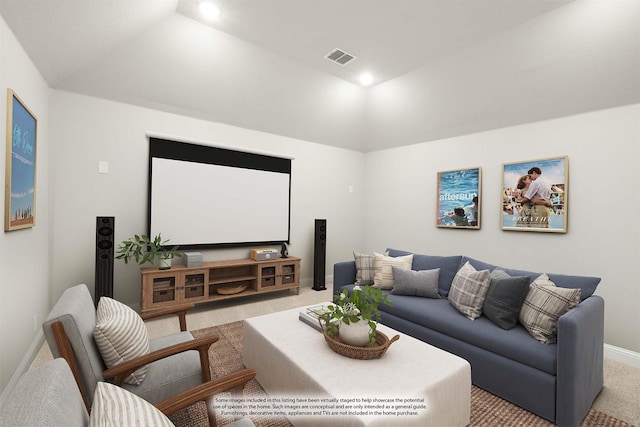 carpeted home theater room featuring vaulted ceiling