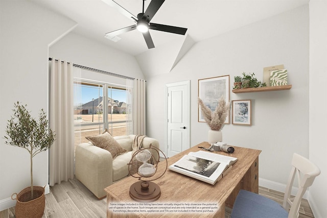 office area with vaulted ceiling, ceiling fan, and light hardwood / wood-style flooring