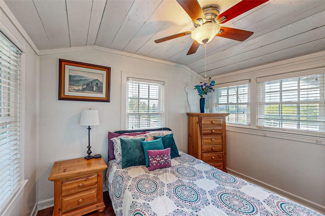 bedroom with ceiling fan, crown molding, wood ceiling, and vaulted ceiling