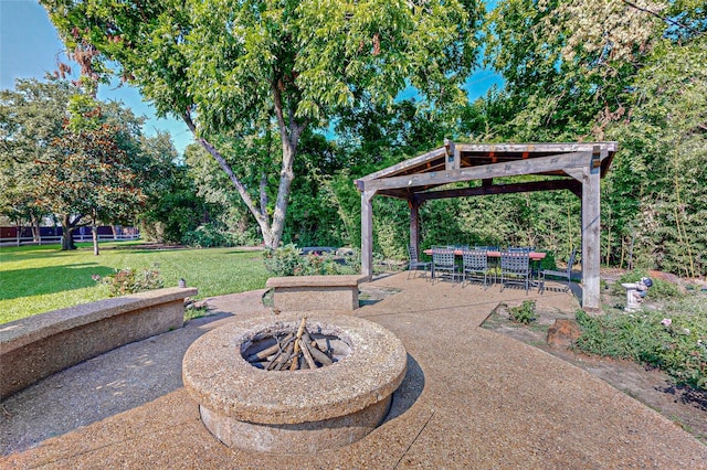 view of patio / terrace featuring a fire pit