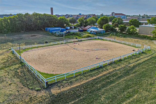 birds eye view of property with a rural view