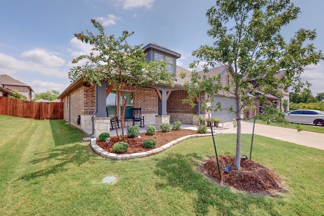 view of front facade featuring a front yard