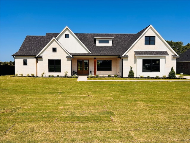 modern inspired farmhouse with french doors and a front lawn