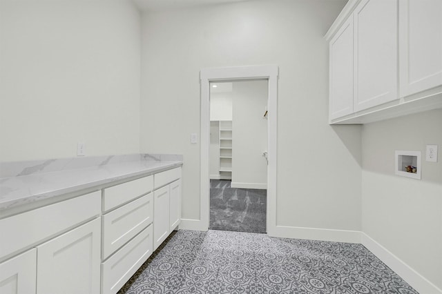 laundry room with cabinets and hookup for a washing machine