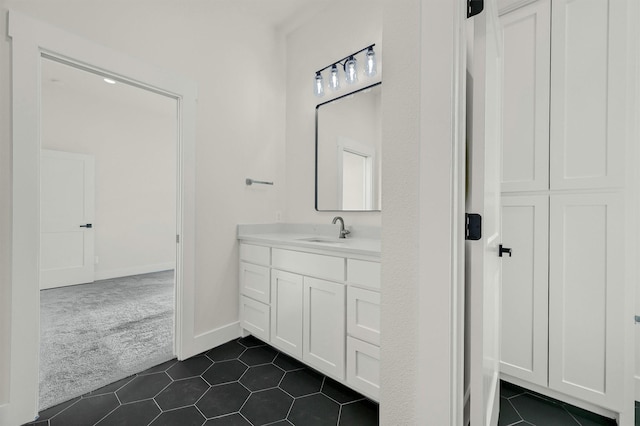 bathroom with vanity and tile patterned floors