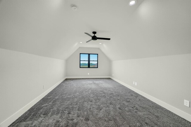 bonus room featuring carpet flooring, ceiling fan, and vaulted ceiling