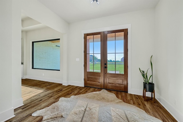 doorway featuring hardwood / wood-style flooring and french doors