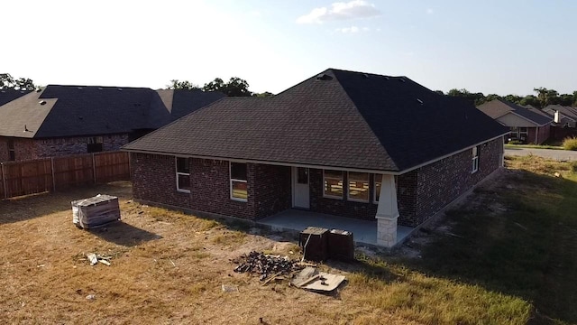 back of property with a patio area