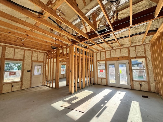 misc room with french doors and a healthy amount of sunlight