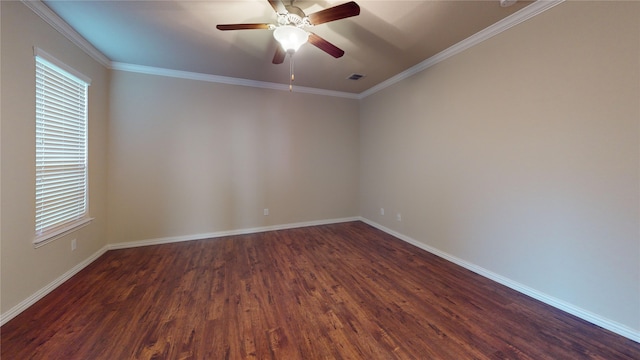 empty room featuring ceiling fan, crown molding, and dark hardwood / wood-style flooring