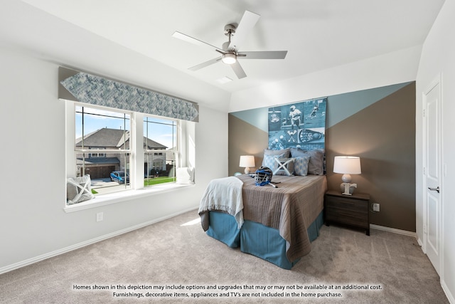 bedroom with ceiling fan and light colored carpet