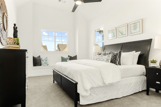 bedroom with ceiling fan and light colored carpet