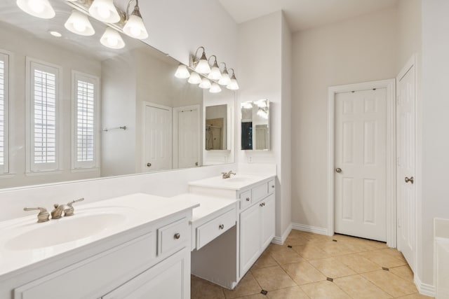 bathroom featuring dual vanity and tile patterned flooring