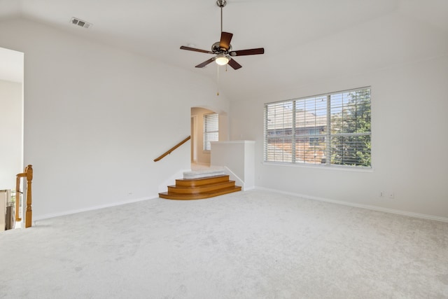 interior space featuring high vaulted ceiling and ceiling fan