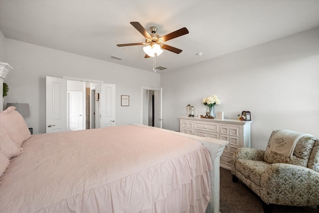 bedroom with ceiling fan and carpet floors