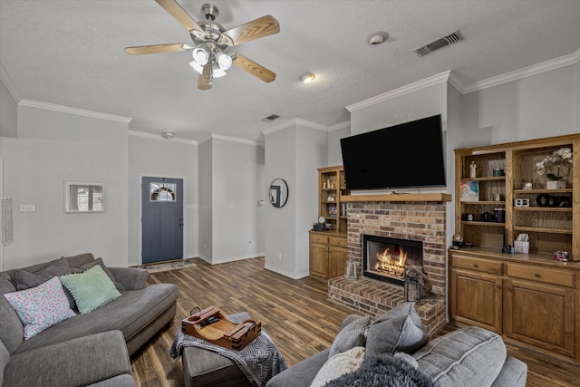 living room featuring dark wood-type flooring and ornamental molding