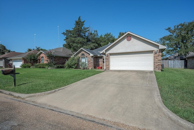 single story home with brick siding, concrete driveway, an attached garage, a front yard, and fence