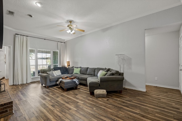 living room featuring ceiling fan, hardwood / wood-style flooring, and crown molding