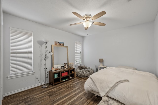 bedroom featuring ceiling fan and wood-type flooring