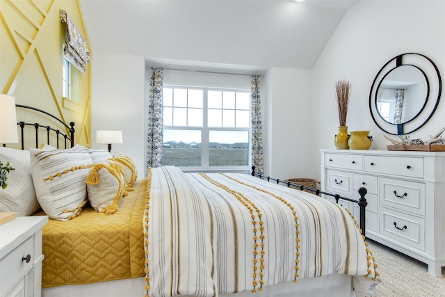 bedroom with lofted ceiling