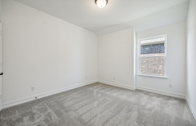 empty room featuring light carpet