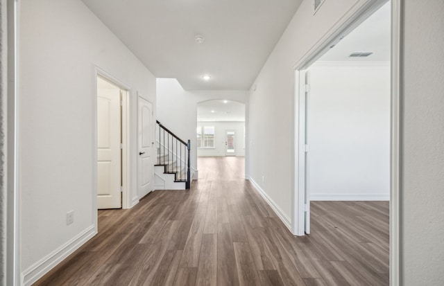 hall with dark wood-type flooring