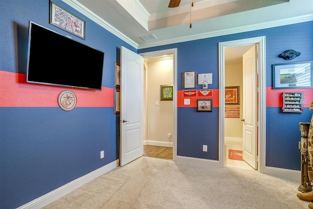 bedroom featuring ensuite bathroom, ornamental molding, carpet, and baseboards