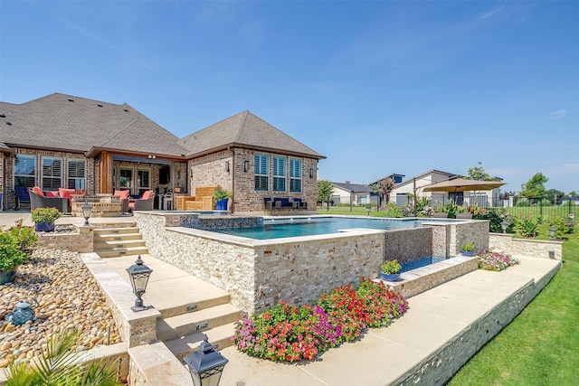 view of swimming pool with a patio, fence, and a fenced in pool