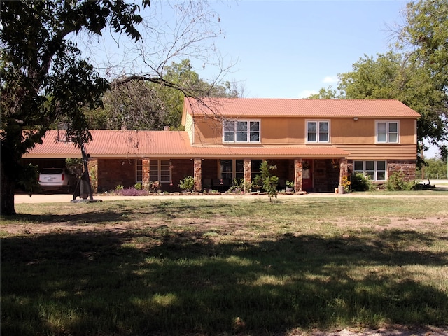 view of front facade featuring a front yard