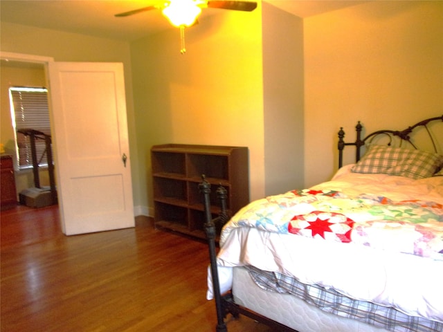 bedroom featuring ceiling fan and wood-type flooring