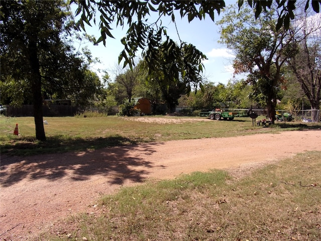 exterior space featuring a shed and a lawn