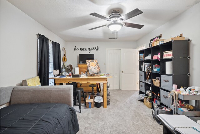 bedroom featuring ceiling fan, carpet floors, and a closet