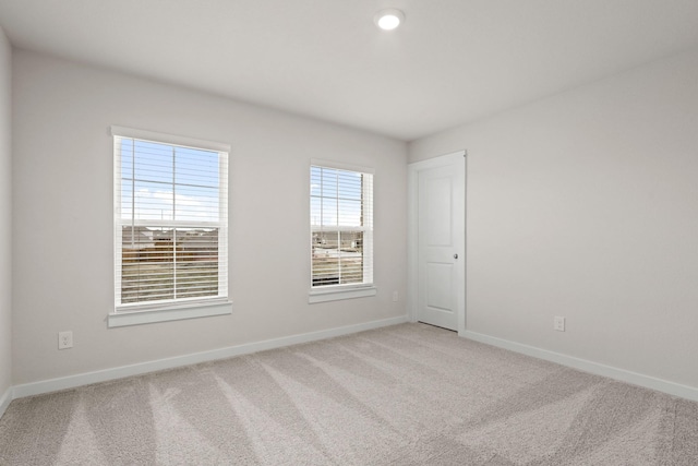 unfurnished room with carpet