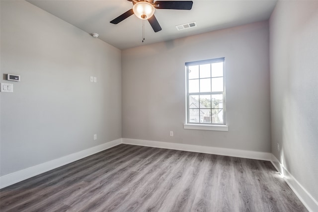 unfurnished room with light hardwood / wood-style flooring and ceiling fan