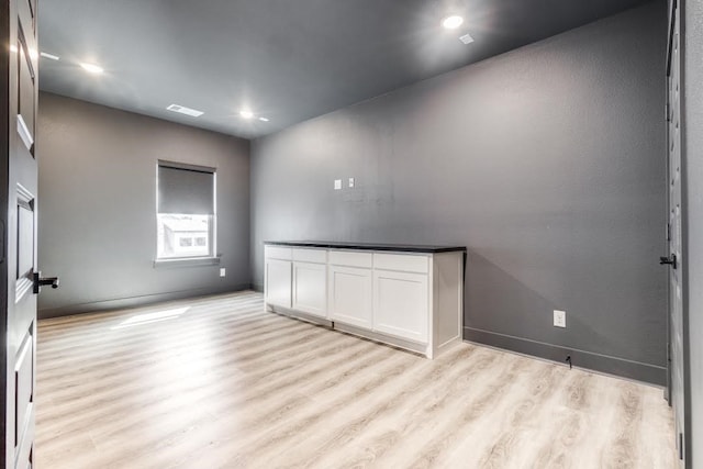 empty room featuring light hardwood / wood-style flooring