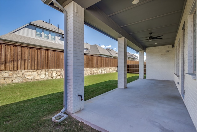 view of patio / terrace featuring ceiling fan