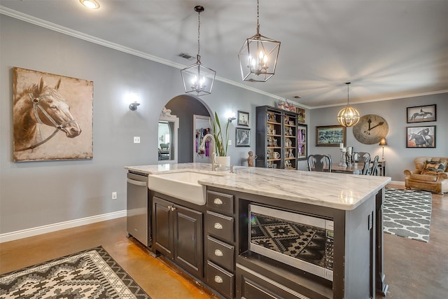 kitchen featuring dishwasher, a kitchen island with sink, crown molding, hanging light fixtures, and sink