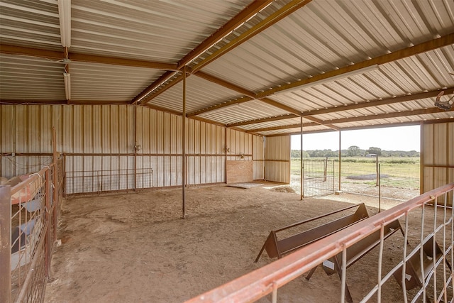 view of stable featuring a rural view