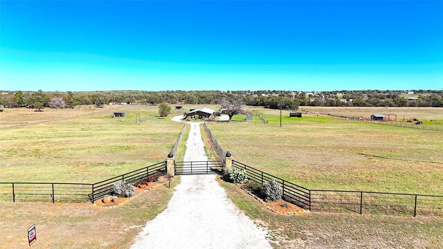 birds eye view of property featuring a rural view