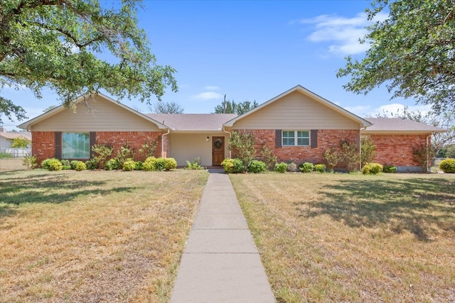 single story home with a front lawn