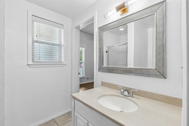 bathroom featuring vanity and tile patterned flooring