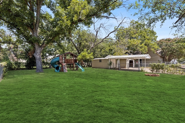 view of yard with a playground