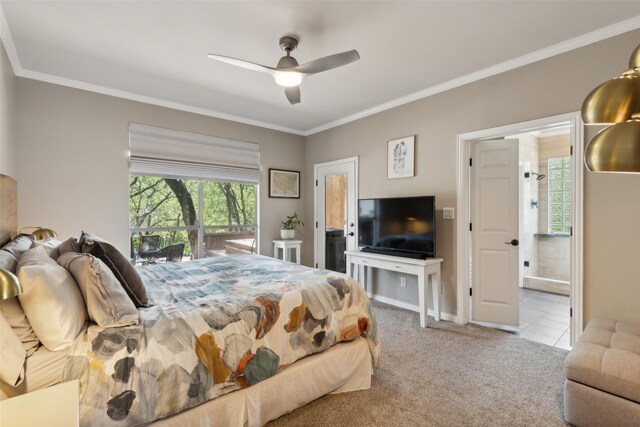 carpeted bedroom featuring crown molding and ceiling fan